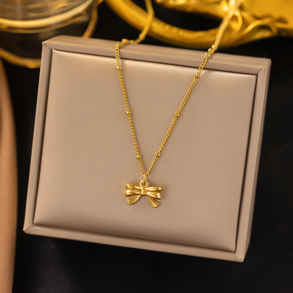 Elegant Gold Bow Pendant Necklace