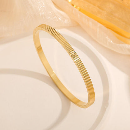 Love Symbol Engraved Anti-Tarnish Bangle - BlingVows - Best Imitation & Anti Tarnish Jewelry Wholesaler